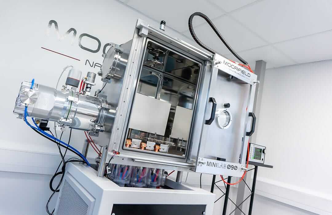 MiniLab090 PVD System with triple thermal sources shown in the chamber.